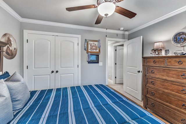 6018 Trotwood Ln, Spring Hill, TN 37174 - carpeted bedroom featuring ornamental molding, a closet, a ceiling fan, and baseboards