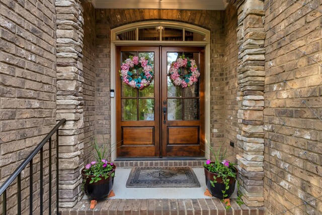 6018 Trotwood Ln, Spring Hill, TN 37174 - property entrance featuring french doors and brick siding
