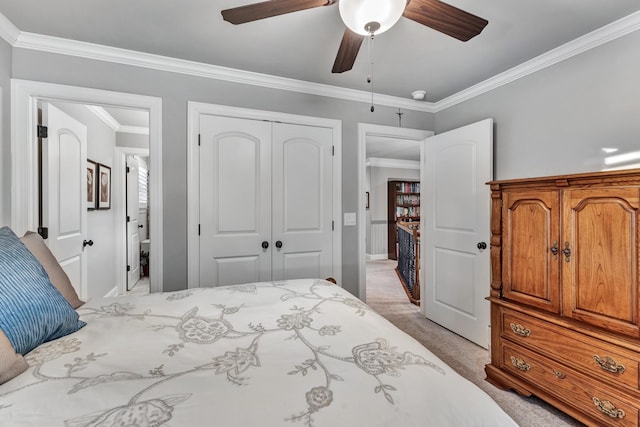 6018 Trotwood Ln, Spring Hill, TN 37174 - bedroom featuring a closet, crown molding, a ceiling fan, and light colored carpet