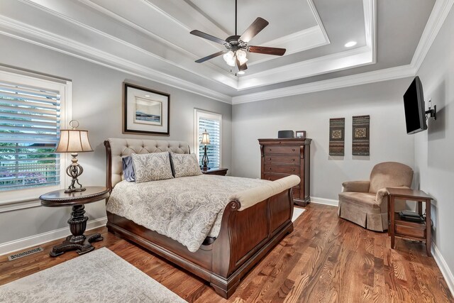 6018 Trotwood Ln, Spring Hill, TN 37174 - bedroom featuring a tray ceiling, wood finished floors, ornamental molding, and baseboards