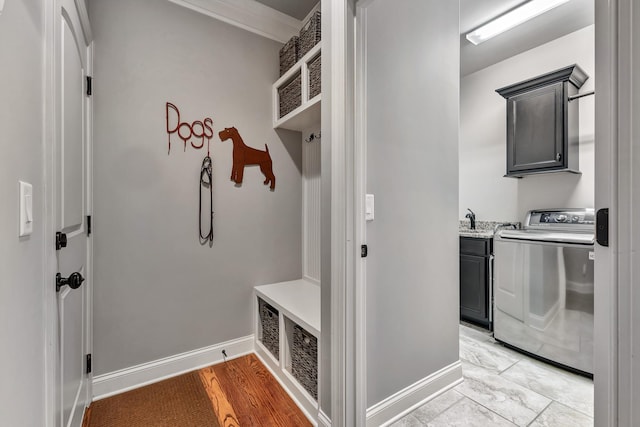 6018 Trotwood Ln, Spring Hill, TN 37174 - mudroom featuring washer / clothes dryer, baseboards, and a sink