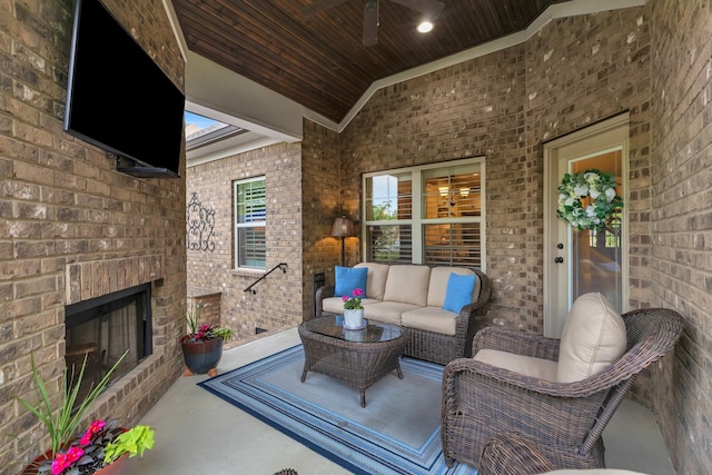 6018 Trotwood Ln, Spring Hill, TN 37174 - view of patio / terrace with an outdoor living space with a fireplace