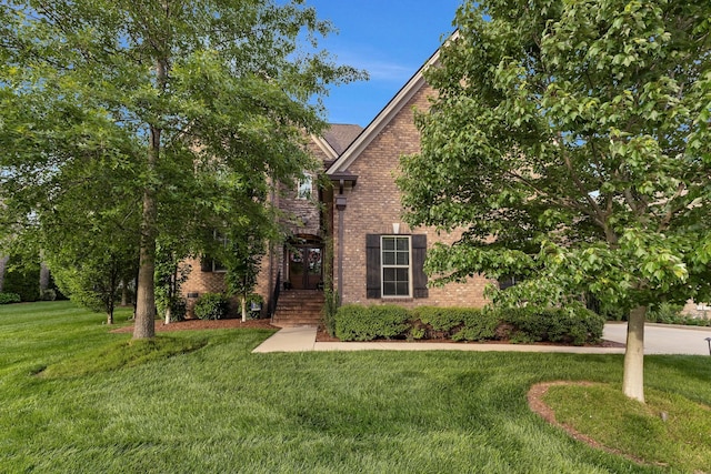 6018 Trotwood Ln, Spring Hill, TN 37174 - view of front of house featuring brick siding and a front lawn