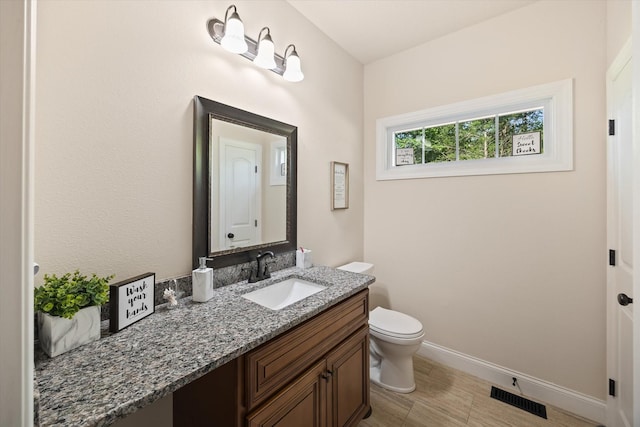 5004 Curtis Way, Cookeville, TN 38506 - bathroom with vanity, toilet, and baseboards