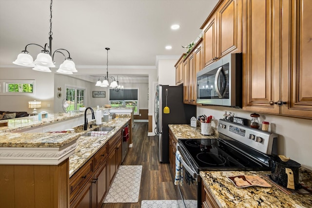 5004 Curtis Way, Cookeville, TN 38506 - kitchen with stainless steel appliances, a chandelier, a sink, ornamental molding, and dark wood-type flooring