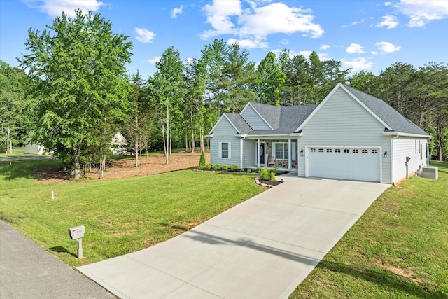 5004 Curtis Way, Cookeville, TN 38506 - view of front of house featuring a garage, concrete driveway, a front yard, and roof with shingles