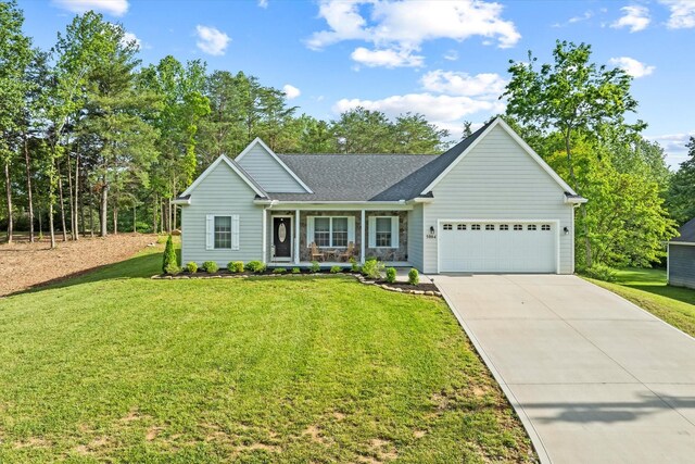 5004 Curtis Way, Cookeville, TN 38506 - ranch-style home featuring an attached garage, concrete driveway, a porch, and a front yard