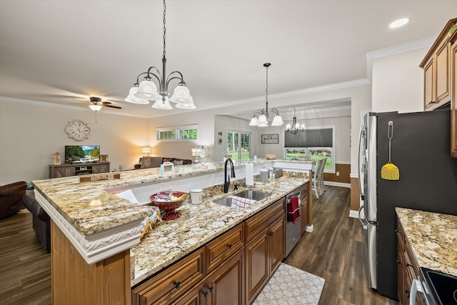 5004 Curtis Way, Cookeville, TN 38506 - kitchen featuring a chandelier, a sink, stainless steel appliances, open floor plan, and dark wood-style floors