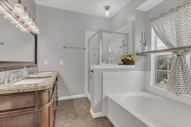 bathroom featuring a shower stall, a bath, baseboards, and double vanity