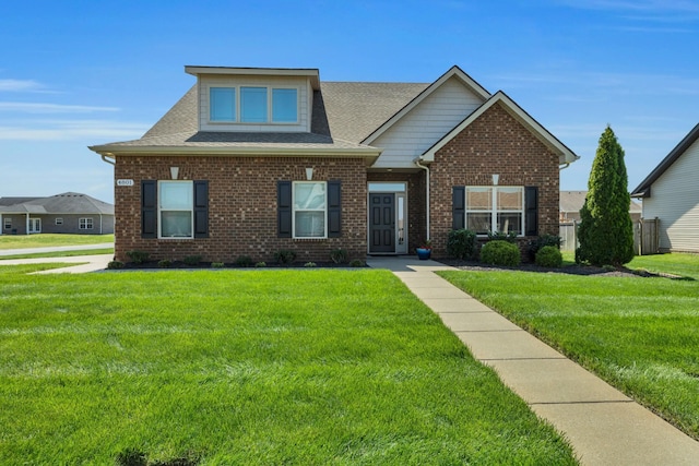 4801 Beryl Dr, Murfreesboro, TN 37128 - view of front of house with a front yard, brick siding, and roof with shingles