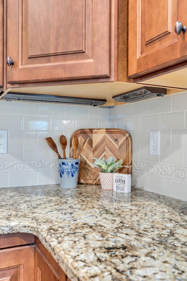 4801 Beryl Dr, Murfreesboro, TN 37128 - kitchen view of decorative backsplash, light stone countertops, and brown cabinets