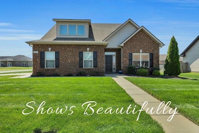 4801 Beryl Dr, Murfreesboro, TN 37128 - view of front of home featuring a front lawn, brick siding, and roof with shingles
