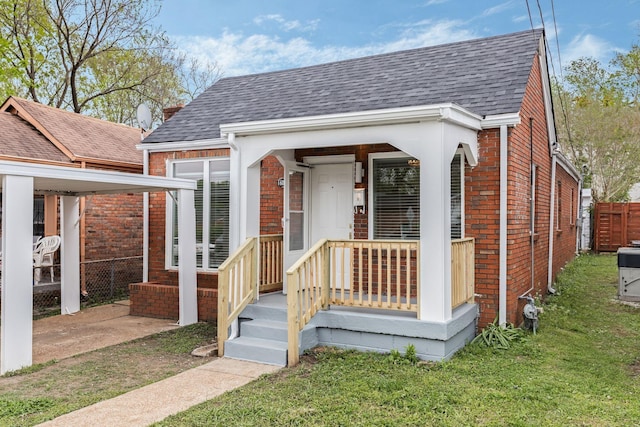 1607 Wheless St, Nashville, TN 37208 - view of front facade with brick siding and roof with shingles