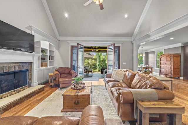 2979 Stewart Campbell Pt, Spring Hill, TN 37174 - living room with ceiling fan, high vaulted ceiling, wood finished floors, recessed lighting, and a stone fireplace