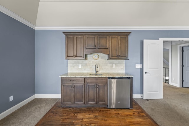 2979 Stewart Campbell Pt, Spring Hill, TN 37174 - kitchen featuring a sink, baseboards, dark colored carpet, light stone counters, and backsplash