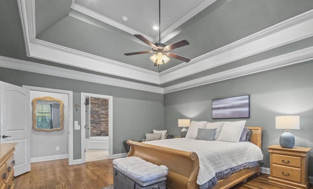 2979 Stewart Campbell Pt, Spring Hill, TN 37174 - bedroom featuring a tray ceiling, ornamental molding, wood finished floors, baseboards, and recessed lighting