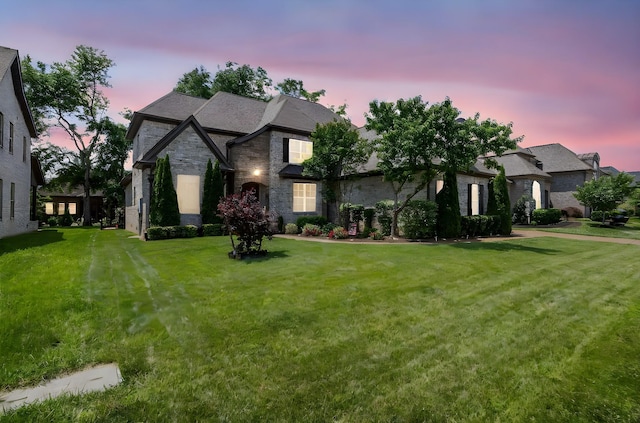 2979 Stewart Campbell Pt, Spring Hill, TN 37174 - french country home featuring a lawn and stone siding