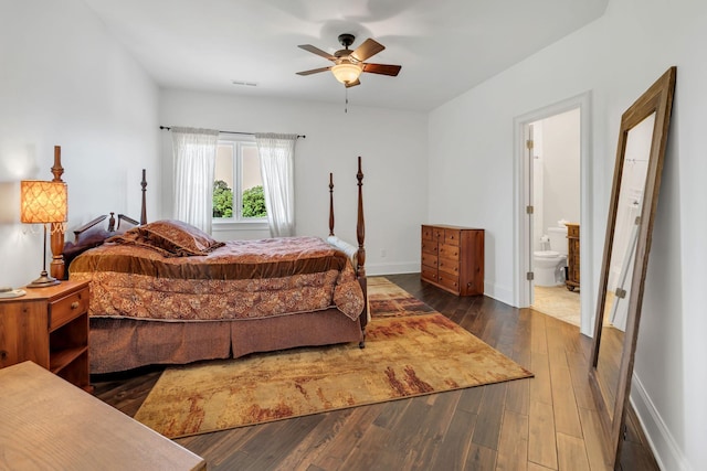 1477 S Harpeth Rd, Kingston Springs, TN 37082 - bedroom featuring wood finished floors, baseboards, ensuite bath, and a ceiling fan