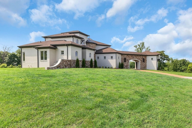 1477 S Harpeth Rd, Kingston Springs, TN 37082 - view of front of home with stone siding and a front yard