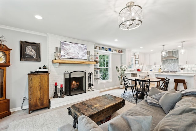 8757 Horton Hwy, College Grove, TN 37046 - living room with a brick fireplace, baseboards, recessed lighting, a chandelier, and ornamental molding