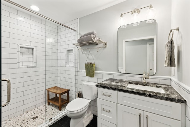 8757 Horton Hwy, College Grove, TN 37046 - full bath with a stall shower, vanity, toilet, and tile walls