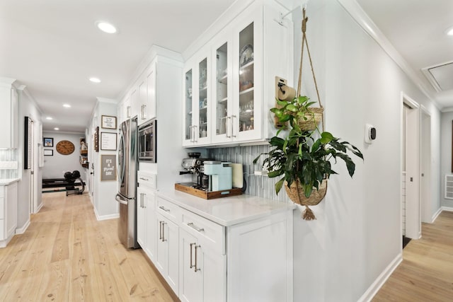 8757 Horton Hwy, College Grove, TN 37046 - hallway with light wood-type flooring, recessed lighting, baseboards, and crown molding