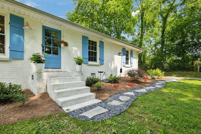 8757 Horton Hwy, College Grove, TN 37046 - view of front of home featuring brick siding, crawl space, and a front yard
