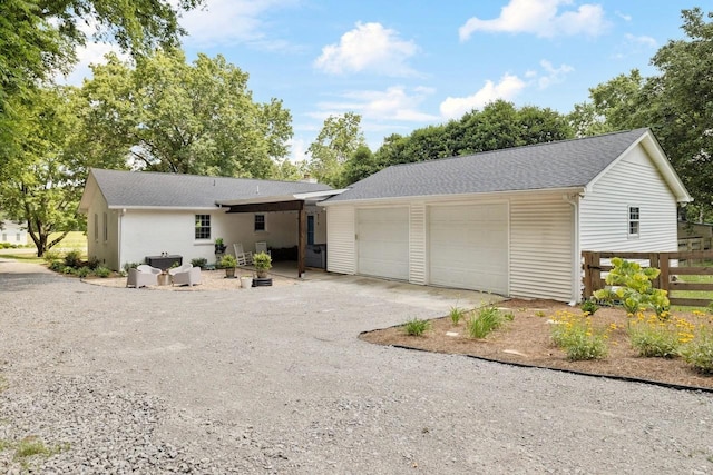 8757 Horton Hwy, College Grove, TN 37046 - single story home with roof with shingles, a garage, and driveway