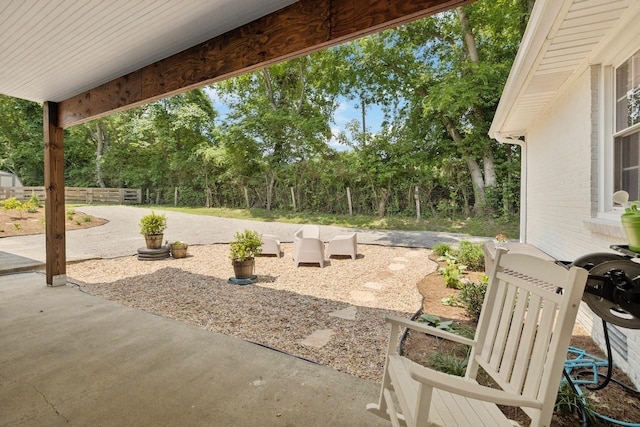 8757 Horton Hwy, College Grove, TN 37046 - view of patio / terrace featuring view of wooded area