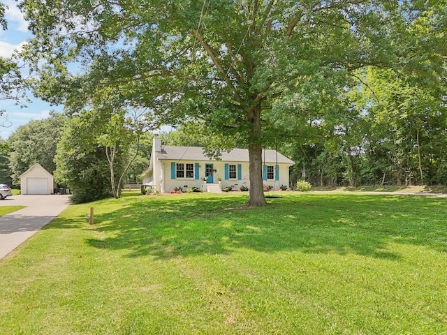 8757 Horton Hwy, College Grove, TN 37046 - view of front of property featuring a chimney, a detached garage, and a front yard
