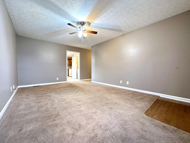 202 Jenna Ave, Oak Grove, KY 42262 - spare room with ceiling fan, carpet flooring, baseboards, and a textured ceiling