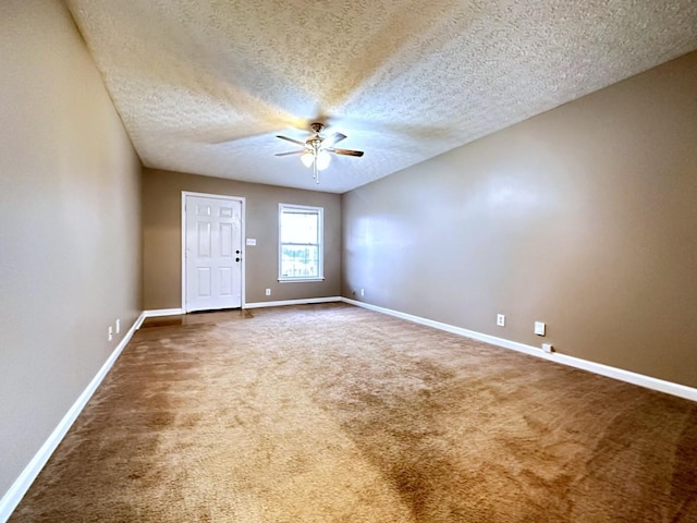 202 Jenna Ave, Oak Grove, KY 42262 - spare room with a ceiling fan, carpet, baseboards, and a textured ceiling