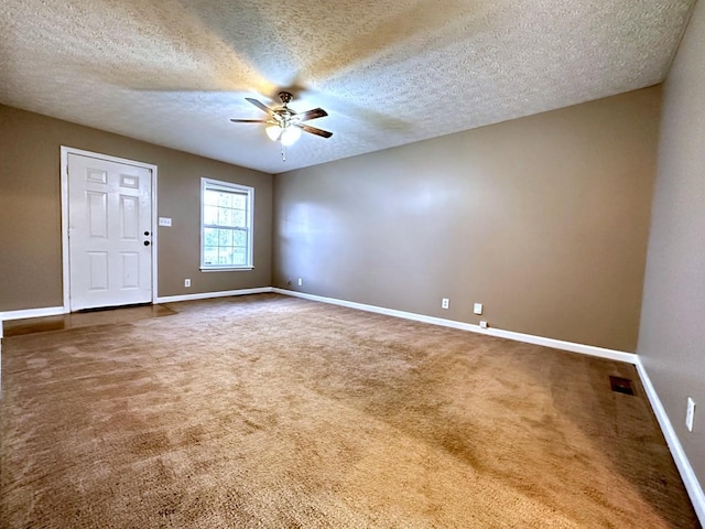 202 Jenna Ave, Oak Grove, KY 42262 - unfurnished room featuring ceiling fan, baseboards, carpet, and a textured ceiling