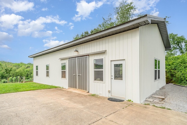 4851 Bethesda Duplex Rd, College Grove, TN 37046 - back of property featuring a patio area and a lawn