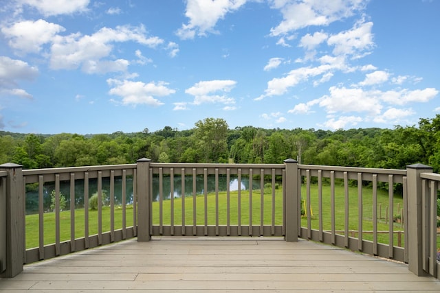 4851 Bethesda Duplex Rd, College Grove, TN 37046 - wooden deck with a forest view, a water view, and a yard