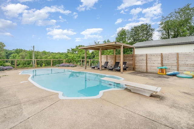 4851 Bethesda Duplex Rd, College Grove, TN 37046 - view of swimming pool with a fenced backyard, a patio, and a diving board