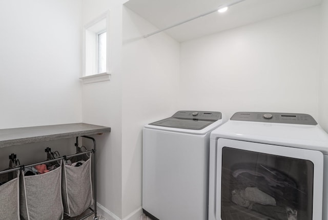 4851 Bethesda Duplex Rd, College Grove, TN 37046 - laundry room with washer and dryer and baseboards