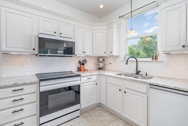 4851 Bethesda Duplex Rd, College Grove, TN 37046 - kitchen featuring white appliances, a sink, white cabinetry, and tasteful backsplash