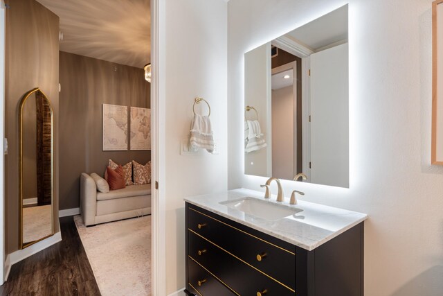 1510 Demonbreun St Unit 1012, Nashville, TN 37203 - bathroom featuring vanity and wood finished floors
