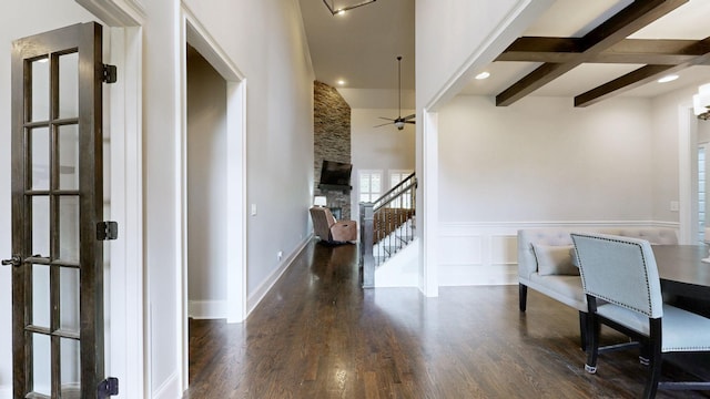 203 W Chandler Ct, Mount Juliet, TN 37122 - entryway featuring a ceiling fan, a fireplace, wood finished floors, beamed ceiling, and a wainscoted wall