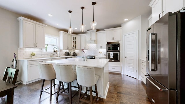 203 W Chandler Ct, Mount Juliet, TN 37122 - kitchen featuring high end fridge, multiple ovens, a sink, dark wood-type flooring, and recessed lighting