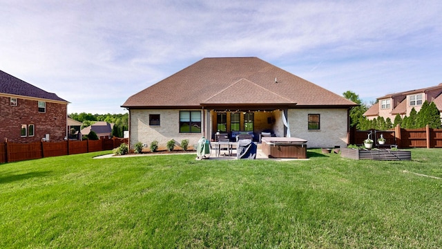 203 W Chandler Ct, Mount Juliet, TN 37122 - rear view of house featuring a hot tub and a patio