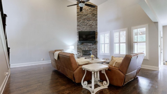 203 W Chandler Ct, Mount Juliet, TN 37122 - living room with a stone fireplace, a ceiling fan, baseboards, dark wood-style flooring, and high vaulted ceiling