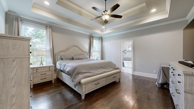 203 W Chandler Ct, Mount Juliet, TN 37122 - bedroom featuring a tray ceiling, dark wood-type flooring, crown molding, baseboards, and ensuite bath