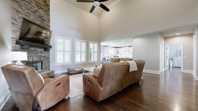 203 W Chandler Ct, Mount Juliet, TN 37122 - living area featuring dark wood finished floors, a fireplace, a ceiling fan, baseboards, and lofted ceiling