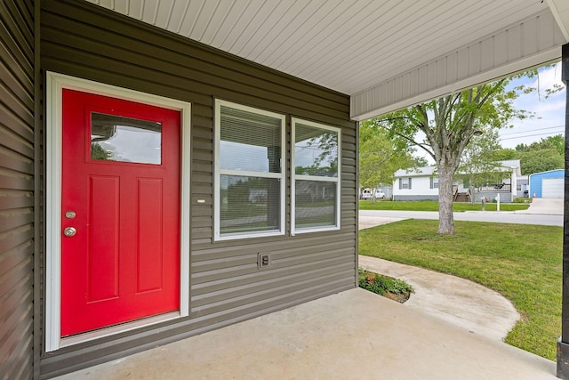 201 Hayes St, Smithville, TN 37166 - doorway to property with a lawn and a porch