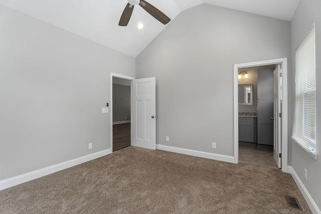 201 Hayes St, Smithville, TN 37166 - unfurnished bedroom with carpet floors, high vaulted ceiling, baseboards, connected bathroom, and ceiling fan