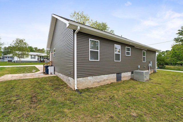 201 Hayes St, Smithville, TN 37166 - view of property exterior with central AC unit, a yard, and crawl space