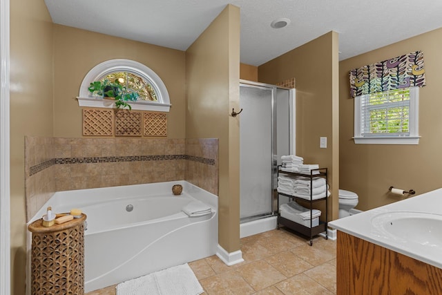102 Lorelle Cir, Portland, TN 37148 - full bathroom with a bath, a stall shower, toilet, vanity, and tile patterned floors