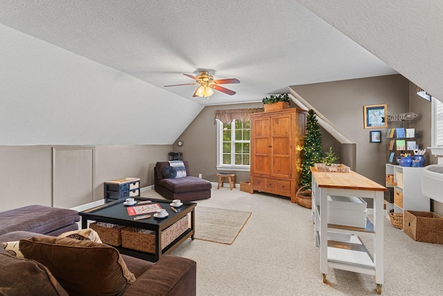 102 Lorelle Cir, Portland, TN 37148 - living room featuring light carpet, a ceiling fan, a textured ceiling, vaulted ceiling, and baseboards